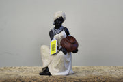 UMA 44694 Cream Polystone Woman Sitting African Decorative Sculpture with Red Water Pot, 6" x 6" x 10"